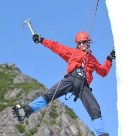 a man flying through the air while riding skis