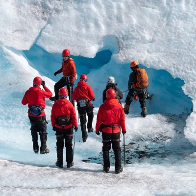 a group of people that are standing in the snow