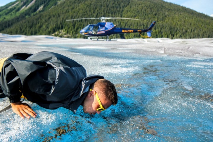 a man swimming in a body of water